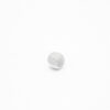 This is a bead, made from plastic and White in colour.