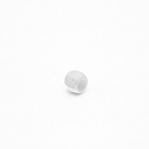 This is a bead, made from plastic and White in colour.