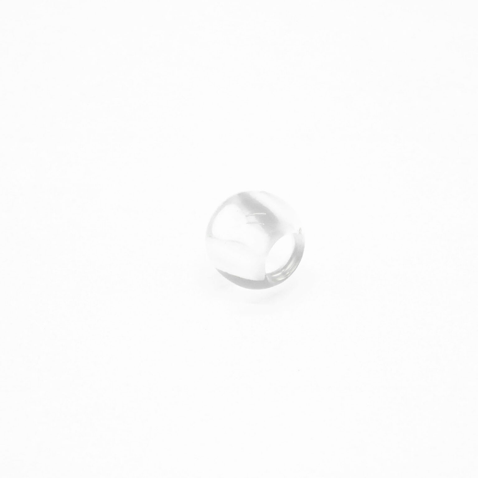This is a bead, made from plastic and Clear in colour.