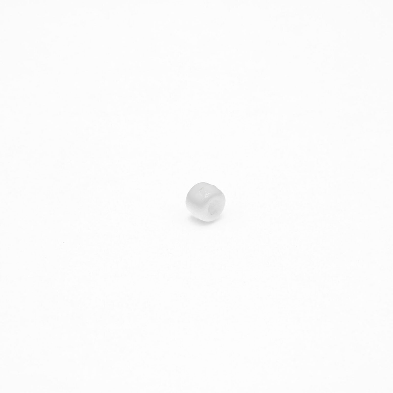 This is a 9mm bead, made from plastic and White in colour.