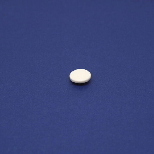 This is a 12.6mm cap, made from brass and White in colour.