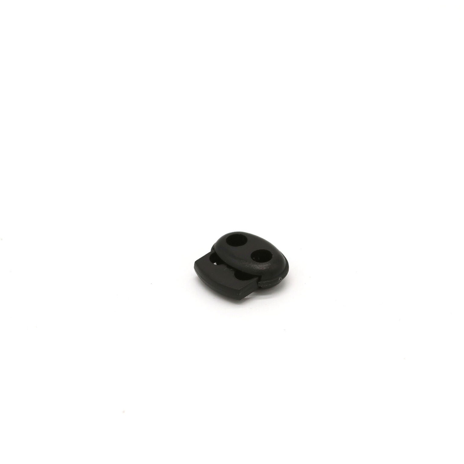 This is a toggle, made from plastic and Black in colour.