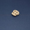 This is a 17mm toggle, made from plastic and Stone in colour.