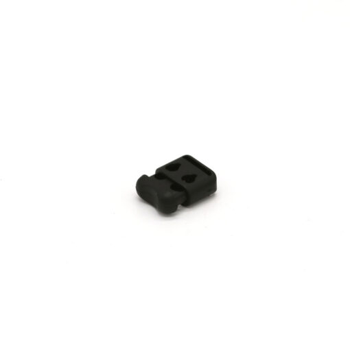 This is a toggle, made from plastic clear and Black in colour.