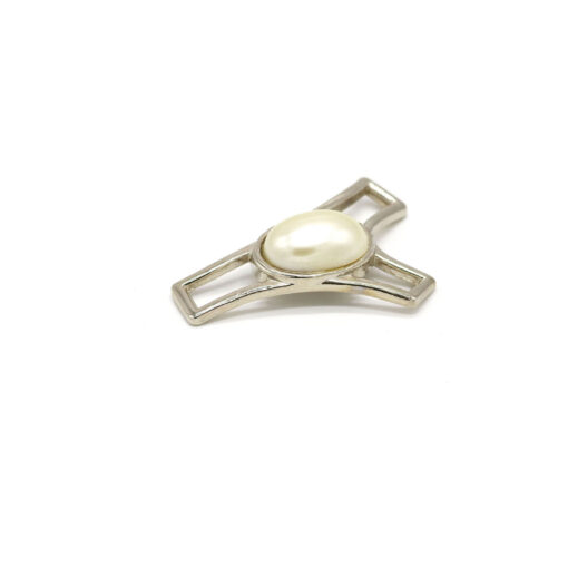 This is a trim, made from plastic and Nickel Plated in colour.