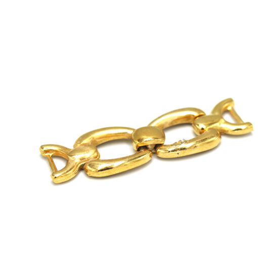 This is a trim, made from cast and Brass in colour.