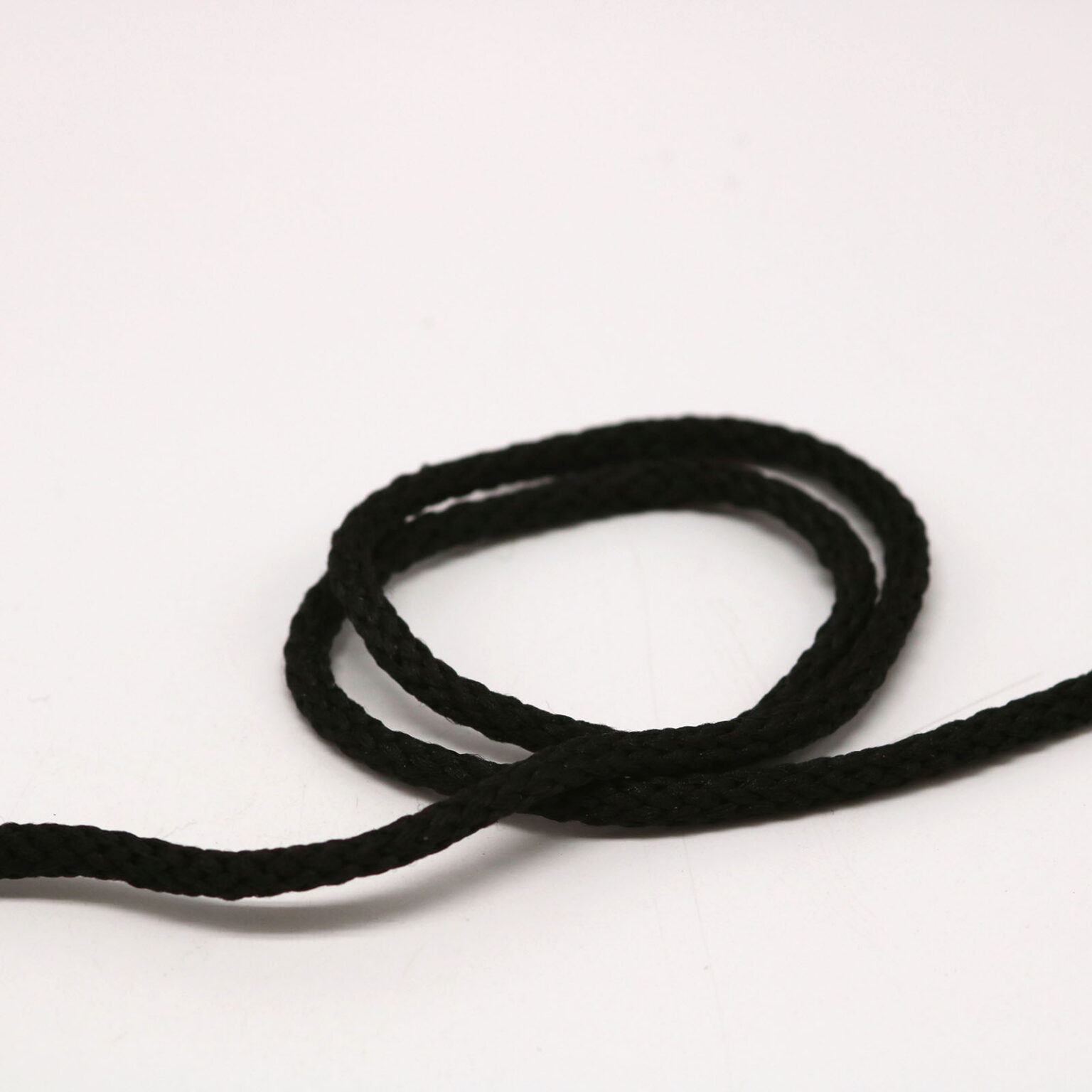This is a 2mm drawcord and Black in colour.