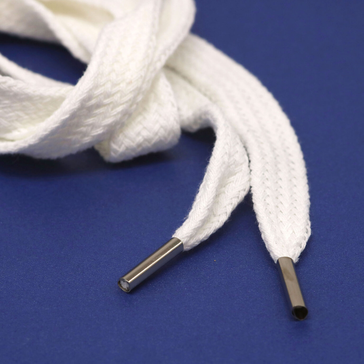 This is a 12mm drawcord, made from cast zinc and White in colour.