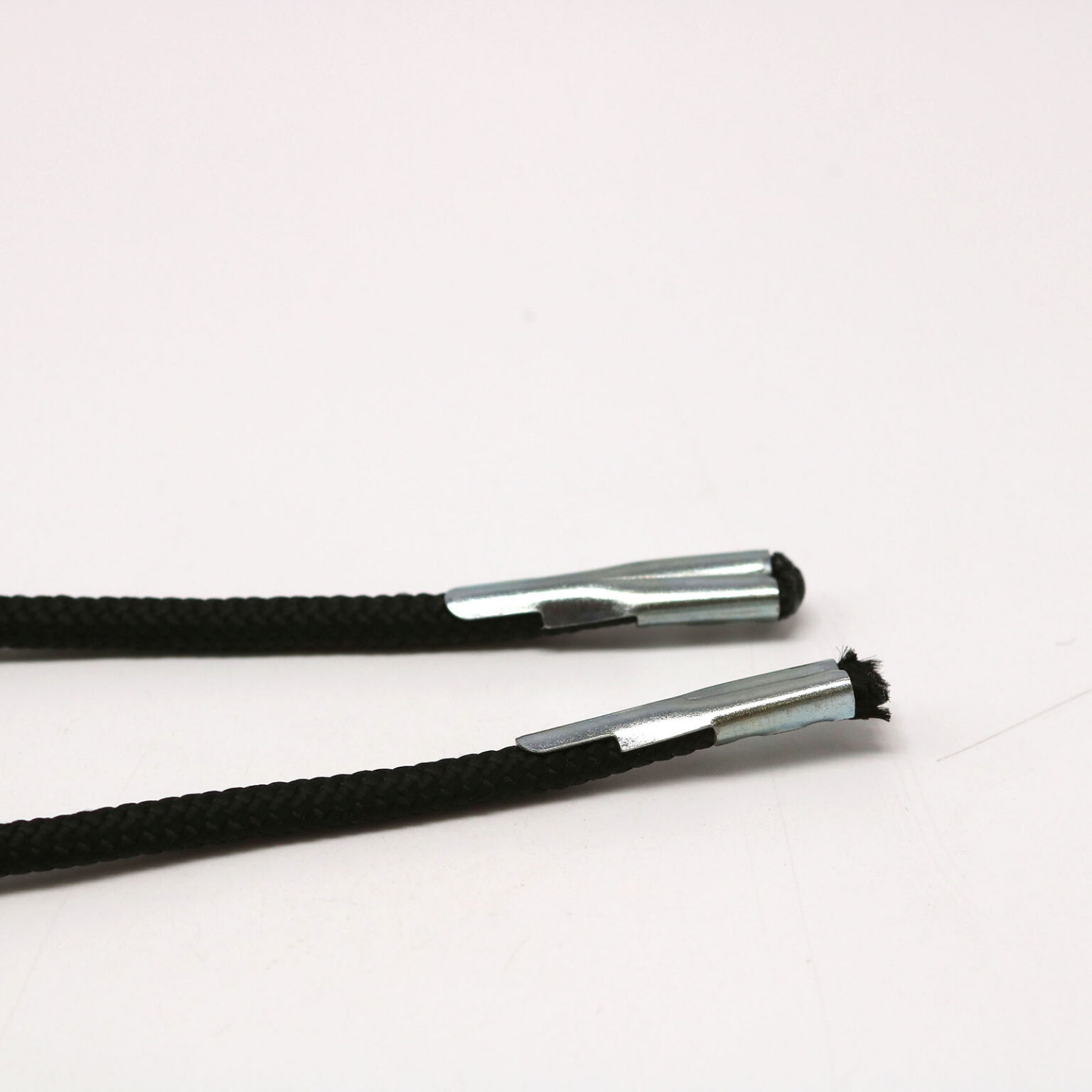 This is a 26mm drawcord, made from plastic and Black in colour.