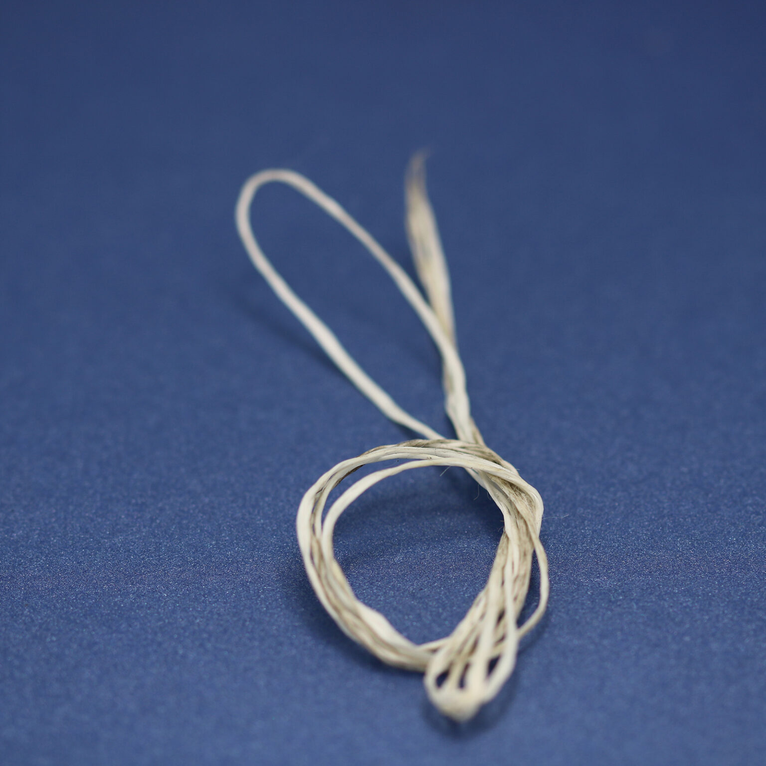 This is a 1mm drawcord, made from textile and White in colour.